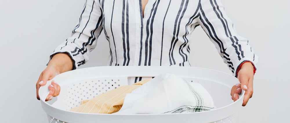 a person with a basket of laundry